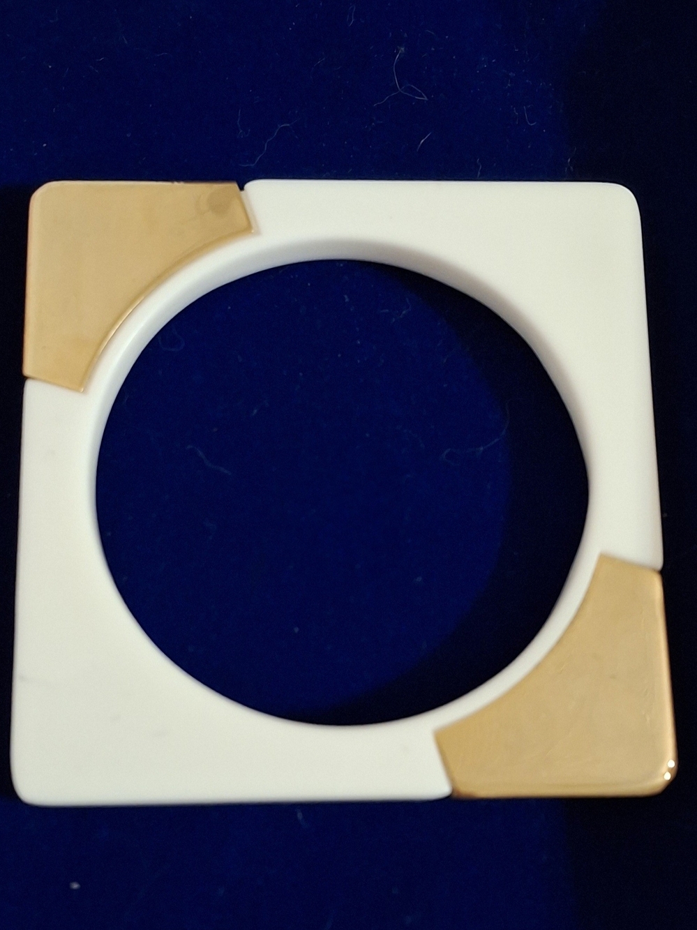 Vintage 1980s designer-style geometric runway bangle, unmarked, white with gold